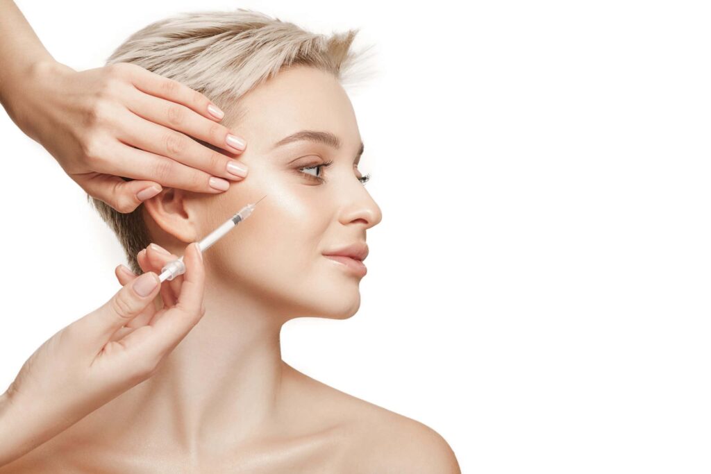 BOTULINUM TOXIN NORTH WEST LONDON 7 people lips cosmetology plastic surgery beauty concept beautiful young woman face hand with syringe making injection 1 scaled